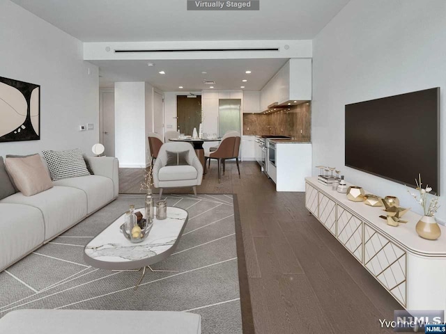 living room featuring dark hardwood / wood-style floors