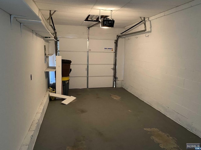 garage featuring a garage door opener