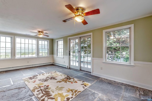 interior space with plenty of natural light, ceiling fan, and ornamental molding