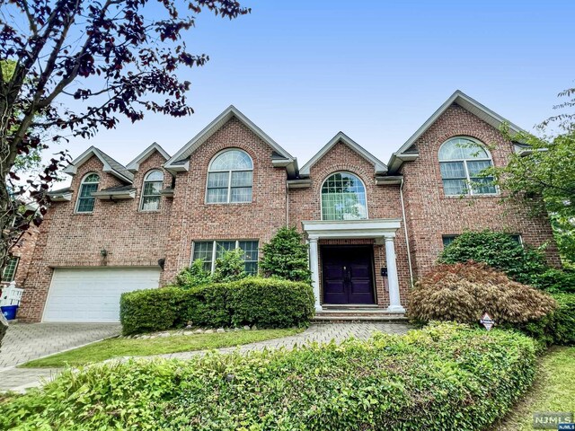 front of property featuring a garage