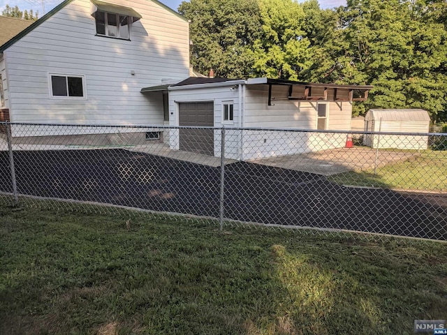 rear view of property with a yard