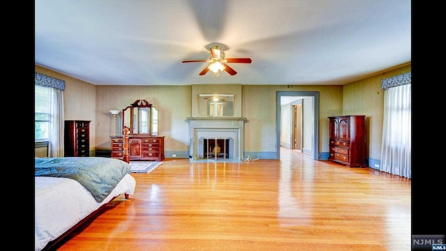 bedroom featuring ceiling fan and light wood-type flooring