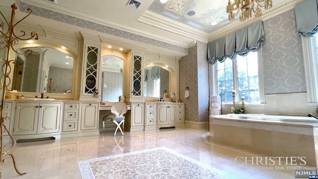 bathroom with a bathing tub, vanity, and crown molding