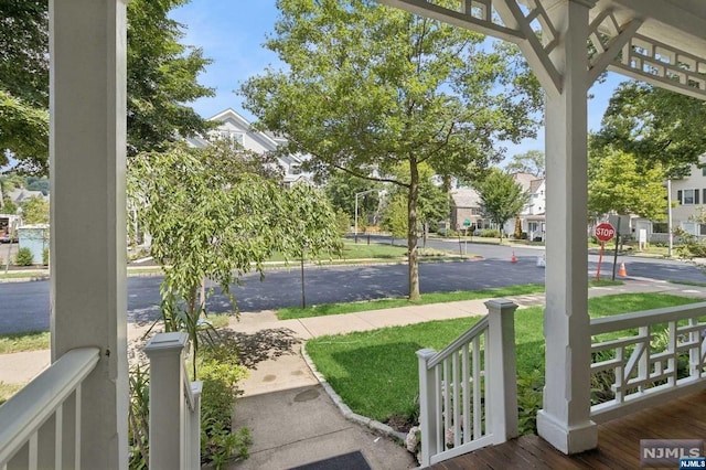 exterior space featuring covered porch