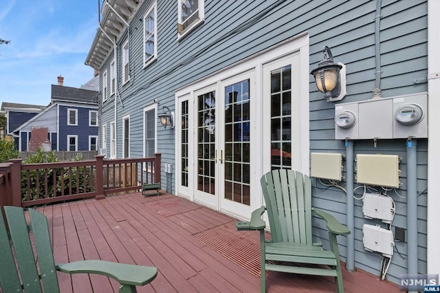 wooden terrace featuring french doors