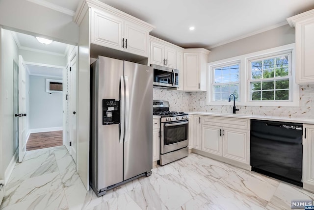 kitchen with appliances with stainless steel finishes, backsplash, crown molding, and sink