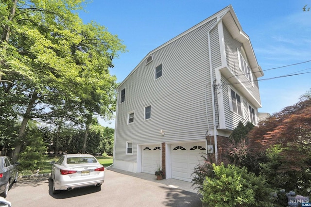 view of home's exterior featuring a garage