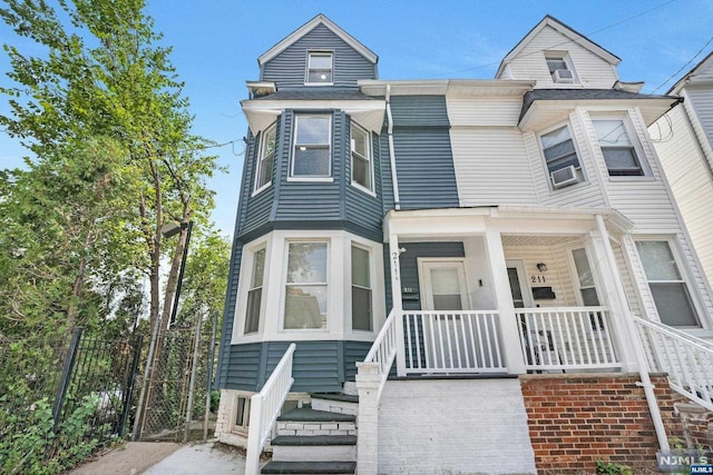 view of property featuring a porch