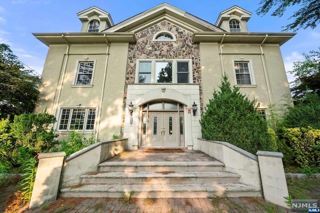 view of front facade with french doors