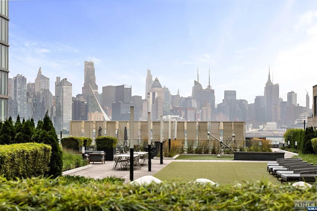 view of home's community with a patio area