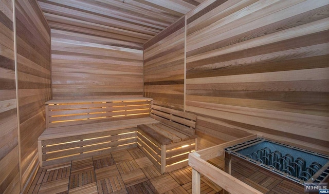 view of sauna / steam room featuring parquet flooring