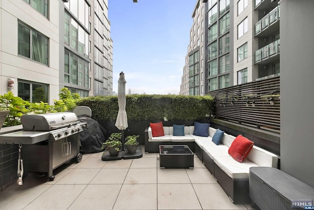 view of patio / terrace with an outdoor hangout area and a grill