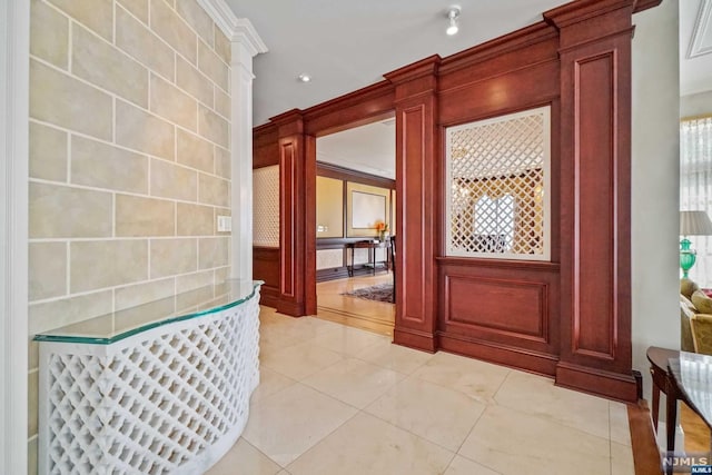 entrance foyer featuring crown molding