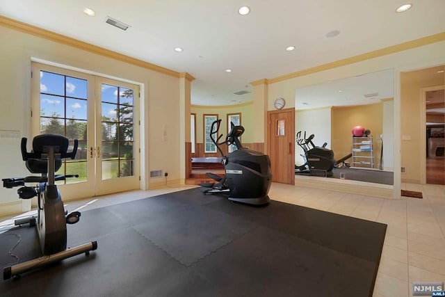 exercise room featuring french doors, light tile patterned floors, and ornamental molding