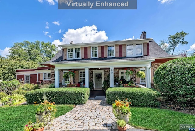 view of front of home featuring covered porch