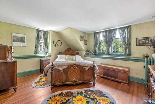 bedroom featuring hardwood / wood-style floors