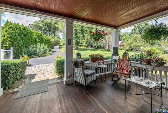 wooden deck with a yard