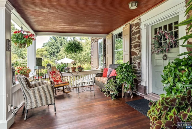 wooden deck with covered porch