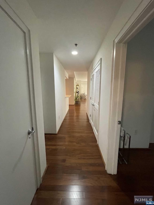 hall featuring dark hardwood / wood-style floors