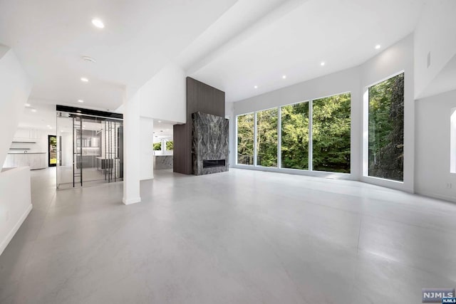 unfurnished living room with a fireplace