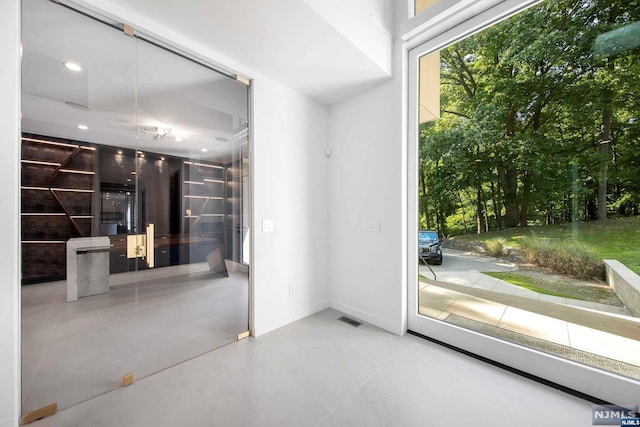 entryway with concrete flooring