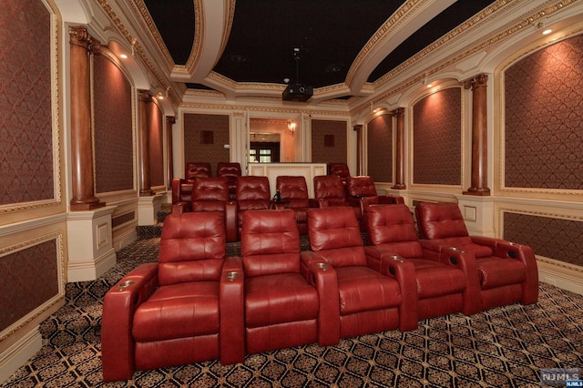 home theater room with ornate columns and ornamental molding