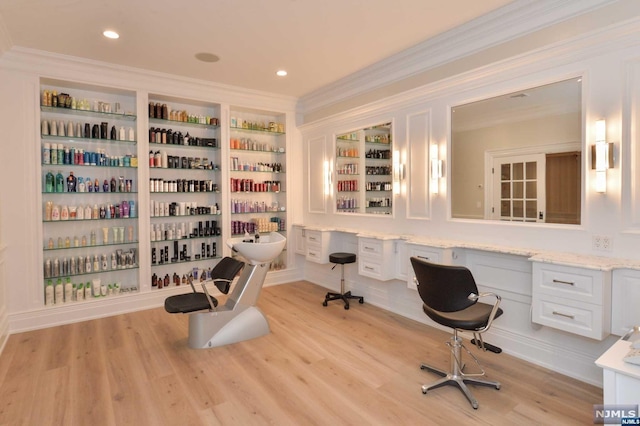 office area featuring crown molding and light hardwood / wood-style flooring