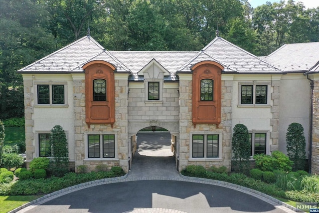 view of french country inspired facade