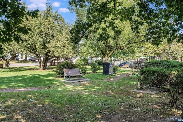 surrounding community featuring a lawn