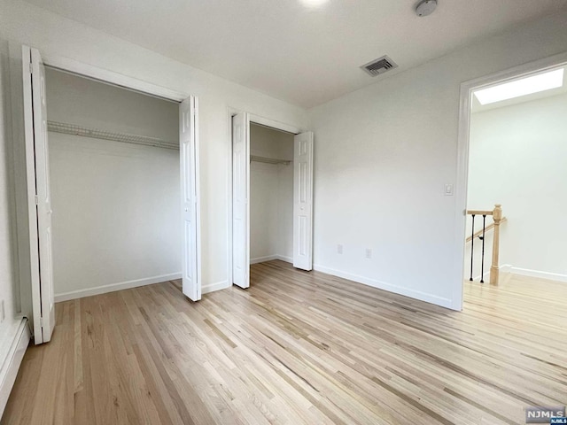 unfurnished bedroom featuring light hardwood / wood-style flooring