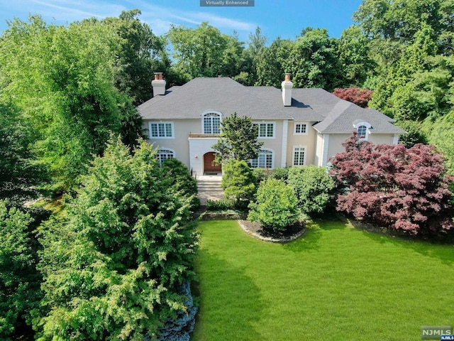 exterior space featuring a front yard