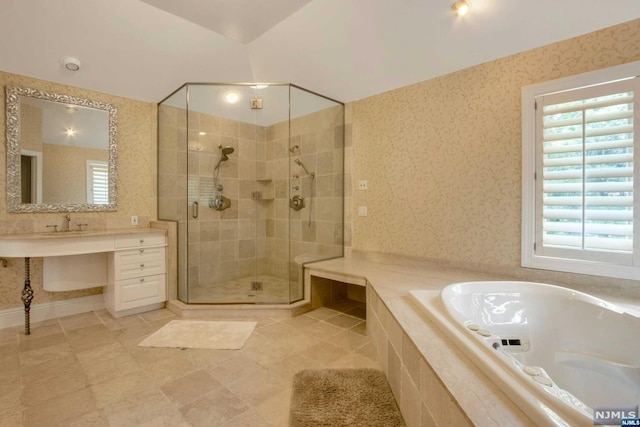 bathroom featuring tile patterned flooring, vanity, and independent shower and bath