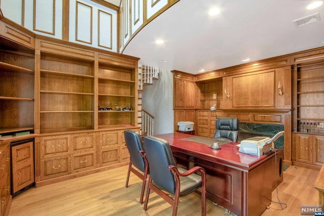 office space featuring light wood-type flooring