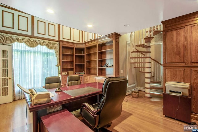 home office with light wood-type flooring