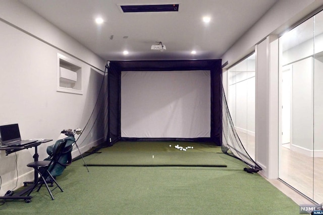 playroom with carpet flooring and golf simulator