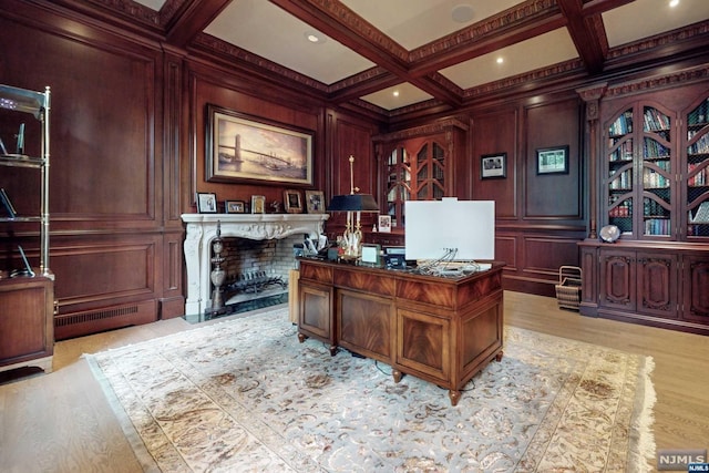 office area with beam ceiling, light wood-type flooring, and coffered ceiling