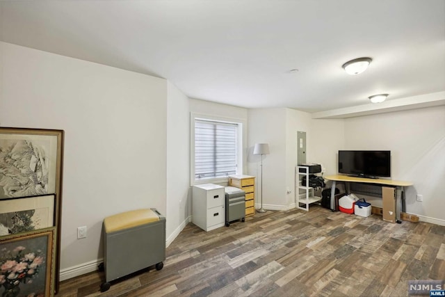 office with dark hardwood / wood-style flooring