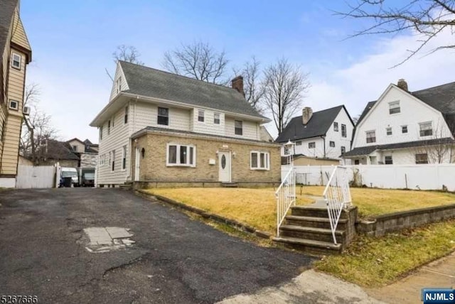 view of front of house with a front yard