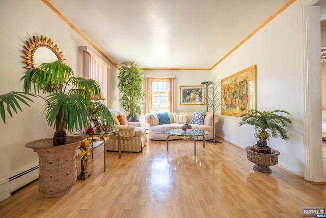 living area featuring light hardwood / wood-style floors, a baseboard radiator, and ornamental molding