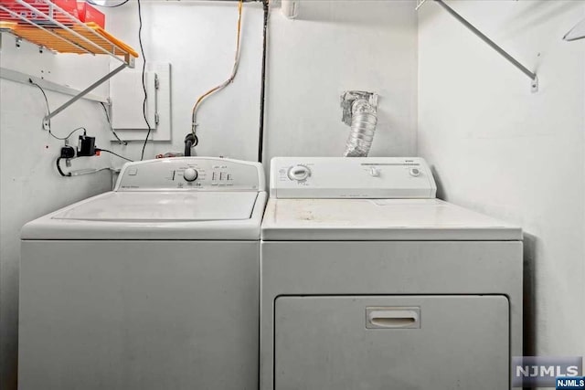 washroom featuring independent washer and dryer