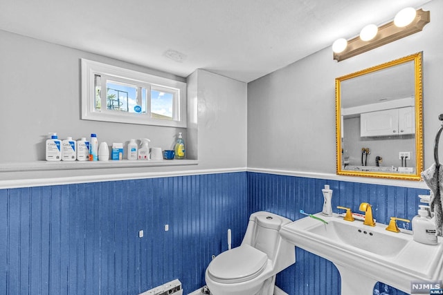 bathroom with sink and toilet