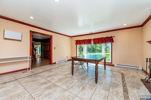 playroom with baseboard heating and ornamental molding