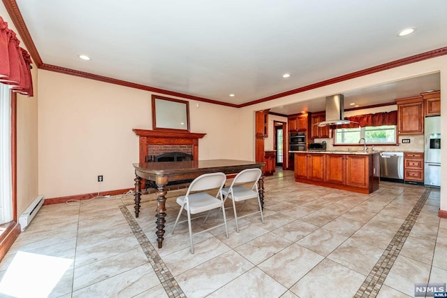 kitchen with appliances with stainless steel finishes, crown molding, sink, a baseboard heating unit, and range hood