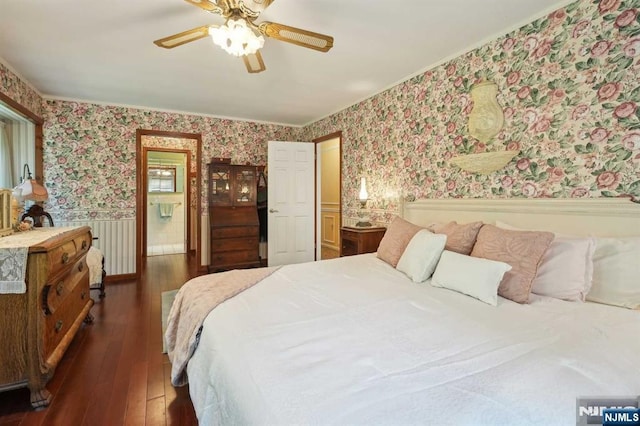 bedroom featuring dark hardwood / wood-style floors and ceiling fan