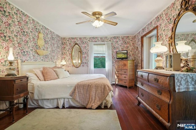 bedroom with ceiling fan and dark hardwood / wood-style floors