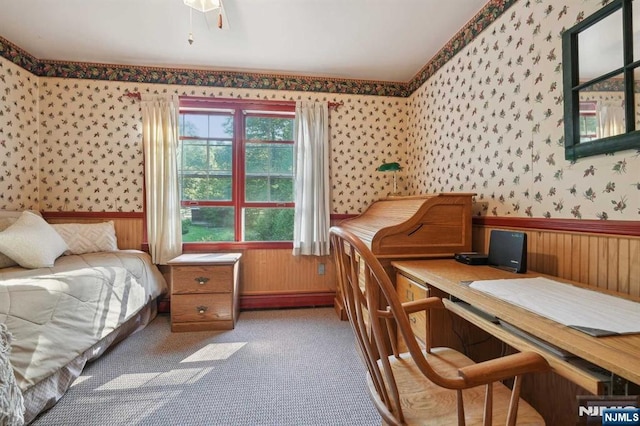 bedroom with carpet and a baseboard radiator