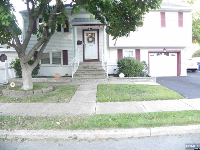 view of front of home with a garage