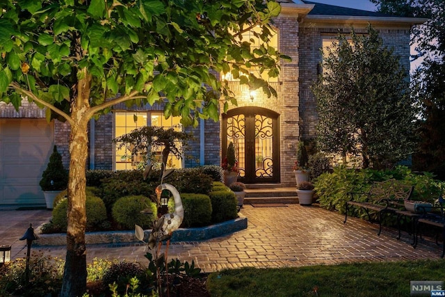 property entrance featuring a garage