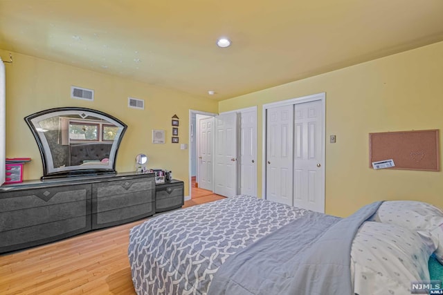 bedroom with wood-type flooring