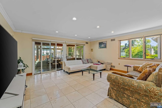 living room with french doors and ornamental molding